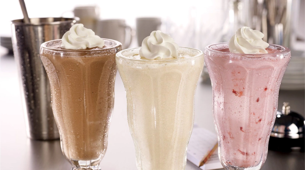 Three different drinks are shown in a row.